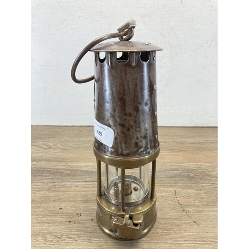 629 - A Protector Lamp & Lighting Co. Ltd Type 6 brass and steel miner's lamp - approx. 24cm high