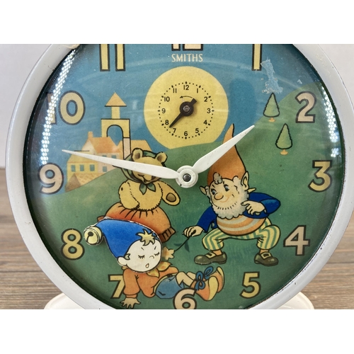 632 - A mid 20th century Smiths Noddy advertising alarm clock - approx. 13cm high x 11.5cm wide