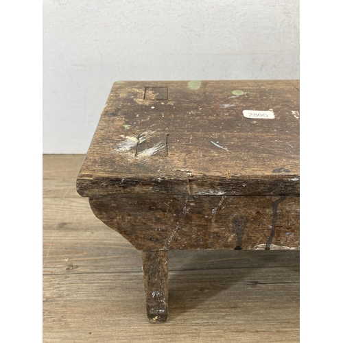 641A - An 19th century oak farmhouse stool - approx. 20cm high x 37cm wide x 17cm deep