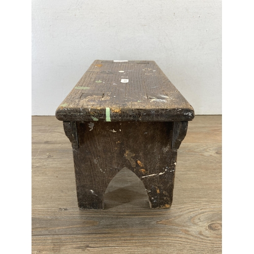 641A - An 19th century oak farmhouse stool - approx. 20cm high x 37cm wide x 17cm deep