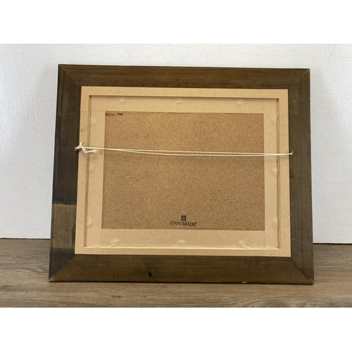 669 - A framed collection of fishing flies for brown trout - approx. 40cm high x 48cm wide