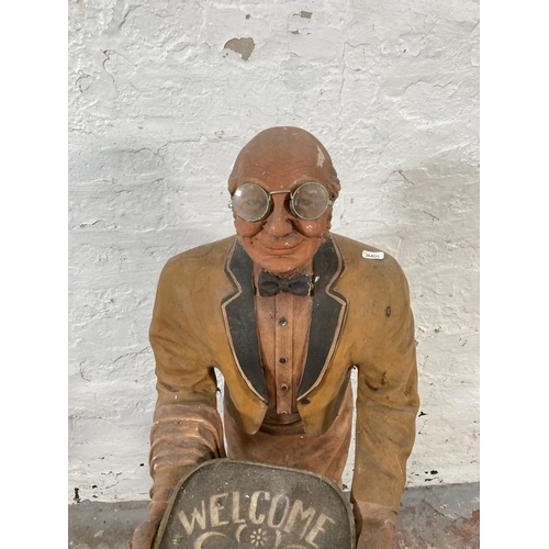 673 - A resin butler with tray restaurant figurine - approx. 87cm high