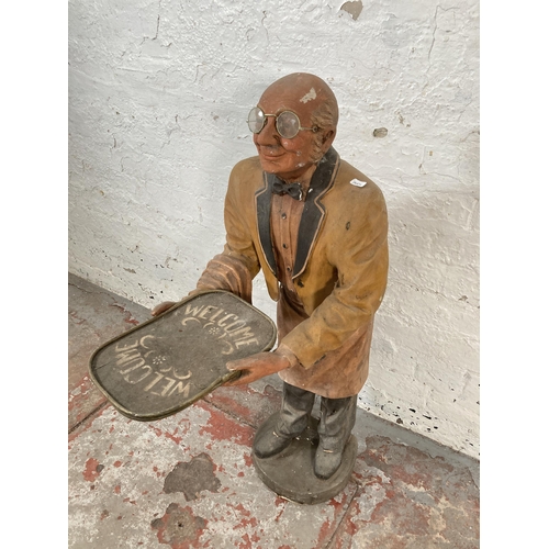 673 - A resin butler with tray restaurant figurine - approx. 87cm high