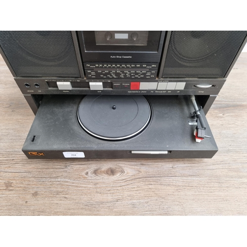 702 - A Panasonic SG-J500L compact stereo system comprising 2-speed turntable, 3-band radio and cassette r... 