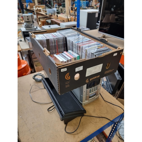 722 - Two items, one Aiwa XR-M33 micro stereo system with a pair of matching speakers and one collection o... 