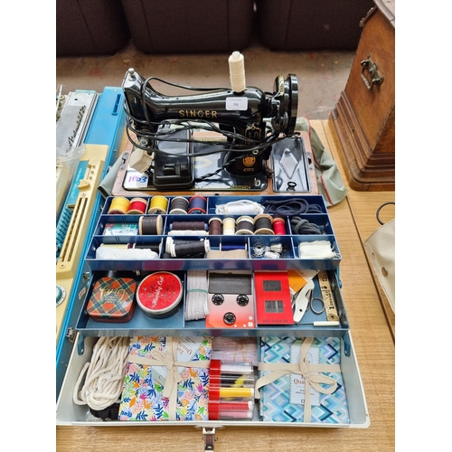 791 - Two items, one Singer 99K electric sewing machine with foot pedal and one storage box containing a l... 