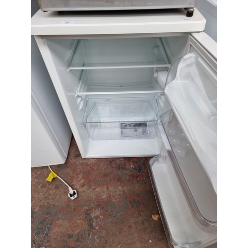 832 - A Zanussi 55cm under counter fridge