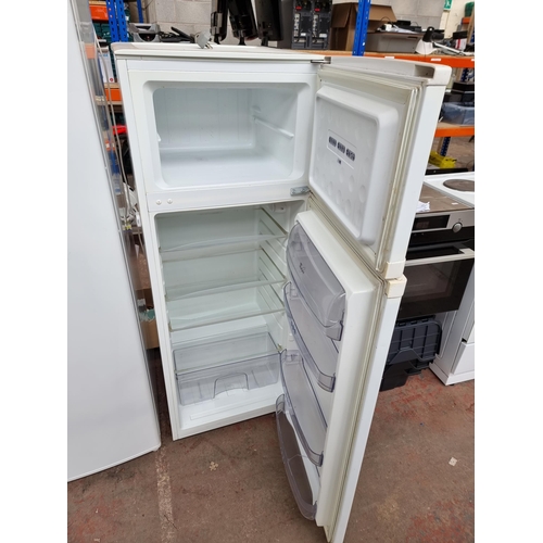 837 - A Whirlpool fridge freezer