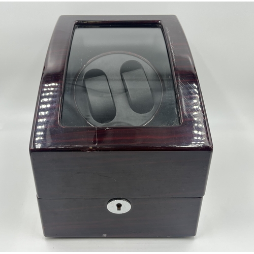 2158 - A rosewood effect 240v watch winder with capacity for five watches and battery slot to reverse