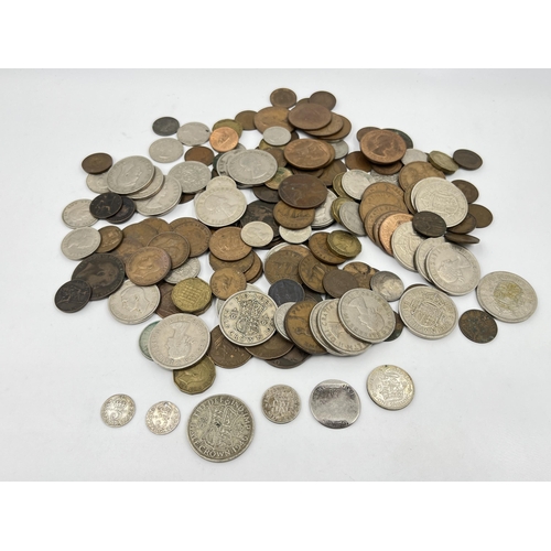 2270 - A collection of British pre-decimal coins with silver examples to include 50% 1946 ½ crown, 1938 shi... 