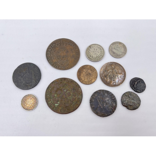 2272 - A collection of antique world coins to include 91.7% silver 1844 Indian two annas, 64% silver 1848 D... 