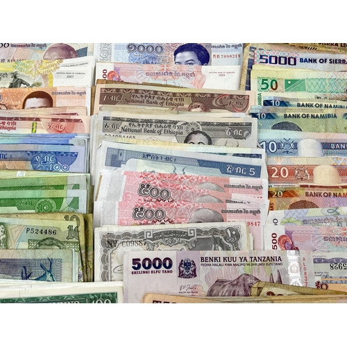 2273 - A collection of banknotes to include Central Bank of Tanzania, Central Bank of Syria, twelve Banco d... 