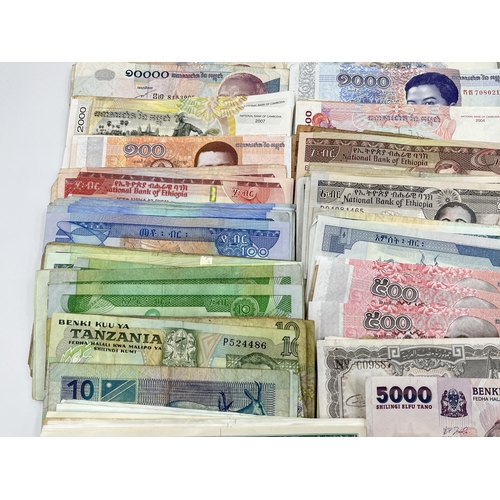 2273 - A collection of banknotes to include Central Bank of Tanzania, Central Bank of Syria, twelve Banco d... 