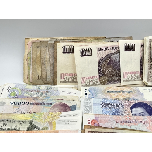 2273 - A collection of banknotes to include Central Bank of Tanzania, Central Bank of Syria, twelve Banco d... 