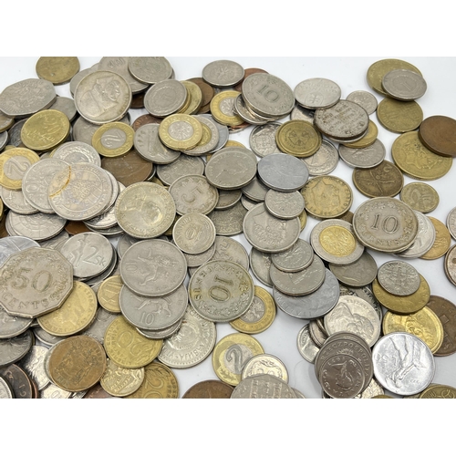 2275 - A collection of world coins to include 50% silver 1933 half crown and 1922 shilling, 92.5% silver 19... 