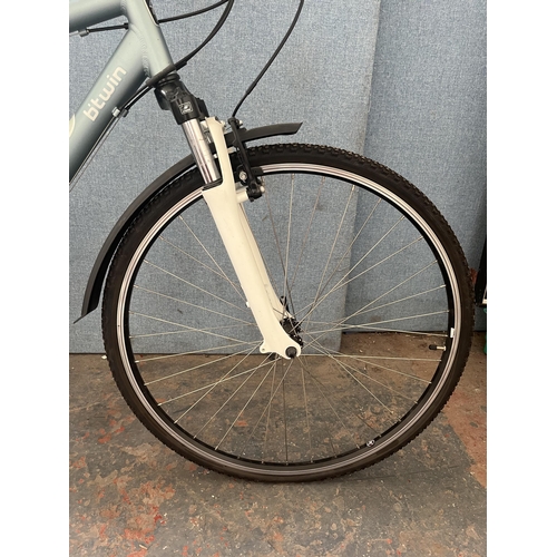 851 - A B'Twin Riverside hybrid bike with Shimano Acer 24 speed gear system