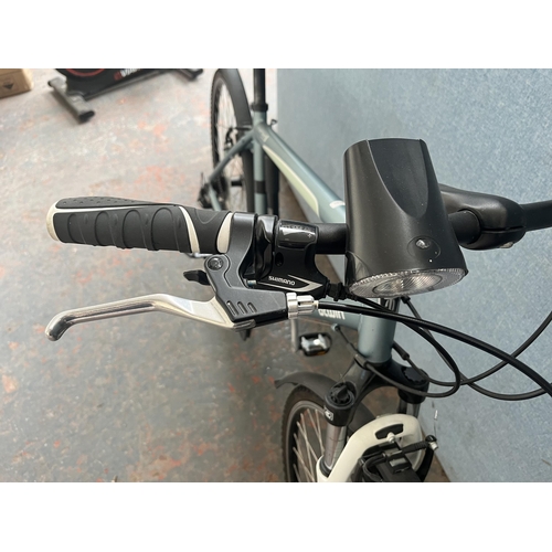 851 - A B'Twin Riverside hybrid bike with Shimano Acer 24 speed gear system