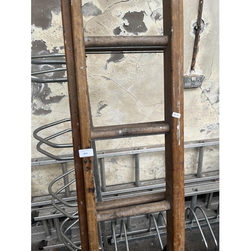 854 - A set of wooden extendable ladders - approx. 12ft long