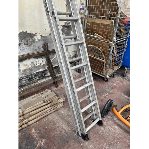 855 - Two pairs of aluminium extending ladders