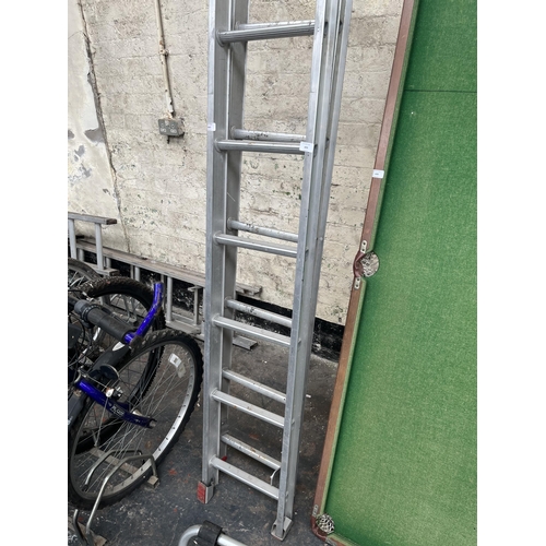 870 - A pair of Clima aluminium extending ladders