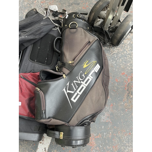 873 - Three pieces of golfing equipment, one Masterlite Caddy and two club bags containing clubs to includ... 