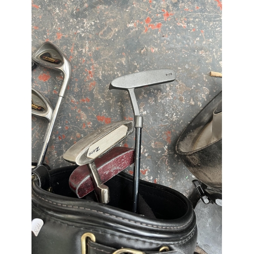 873 - Three pieces of golfing equipment, one Masterlite Caddy and two club bags containing clubs to includ... 