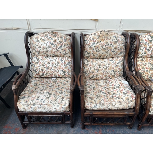 880 - A Dovedale Products Ltd three piece bamboo and wicker conservatory set with floral upholstered cushi... 