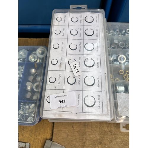 942 - Twelve cased set of nuts, bolts, washers, retaining rings and glass fuses