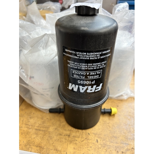 950 - A collection of various oil and fuel filters for commercial vehicles