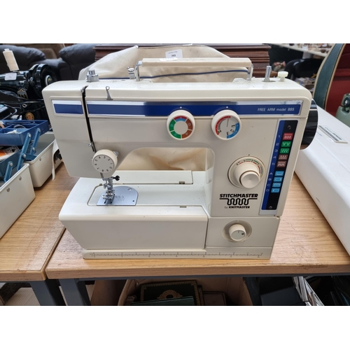 793 - A cased Knitmaster Stitchmaster 885 electric sewing machine with foot pedal, accessories and instruc... 