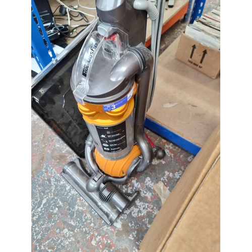 815 - A Dyson DC25 upright bagless vacuum cleaner