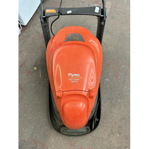 1004 - A Flymo Easiglide 240v lawn mower