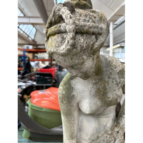 1007 - A cast stone nude lady garden statue on pedestal base - approx. 139cm high