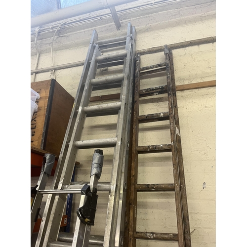 918 - Three pairs of ladders, two aluminium and one wooden