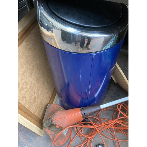 1024 - A collection of house clearance items to include Brabantia bin, Flymo 240v strimmer, gilt framed wal... 