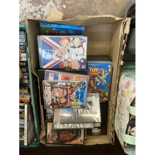 1034 - Four boxes and four bags containing DVDs, vinyl records and video games