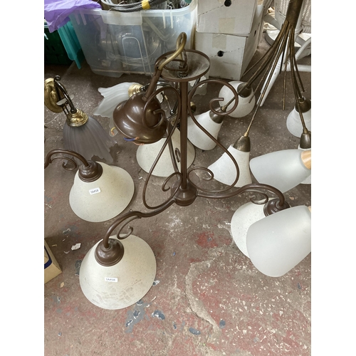 1045 - A collection of lighting to include Tiffany style table lamp, wall sconces, pair of three branch cei... 