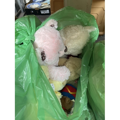 1086 - Three boxes and two bags containing a large collection of soft toys and dolls to include Galoob bear... 