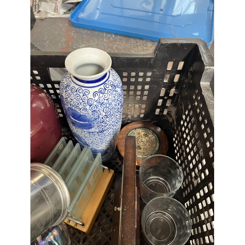 1087 - Four boxes containing mid 20th century style articulated desk lamp, Pyrex dishes, treenware, framed ... 