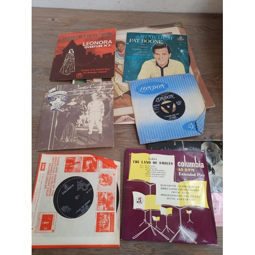 757 - A box and a record case containing vinyl records to include The Dave Brubeck Quartet, Ella Fitzgeral... 