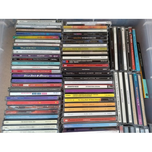 770 - Two boxes containing a collection of CDs and DVDs to include The Beatles, Oasis, The Rolling Stones ... 