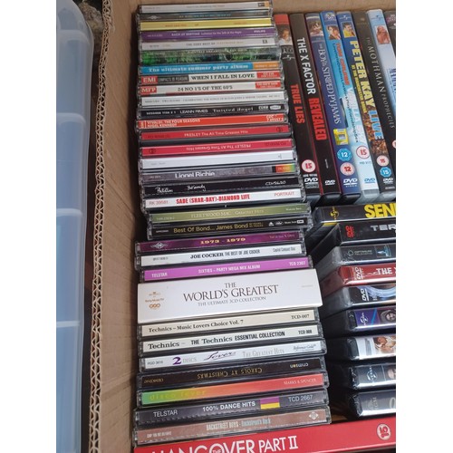 770 - Two boxes containing a collection of CDs and DVDs to include The Beatles, Oasis, The Rolling Stones ... 