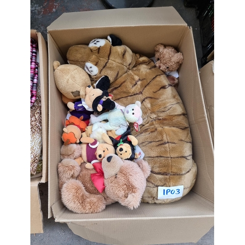 1092 - Four boxes containing soft toys, linen material, books, ceramics etc.