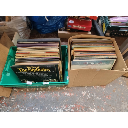 1115 - Nine boxes containing a large collection of vinyl records