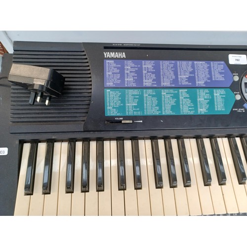 782 - A Yamaha PSR-185 electronic keyboard with stand and power adaptor