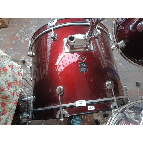 784 - A Performance Percussion five piece drum kit comprising bass drum, floor tom, two rack toms, snare w... 