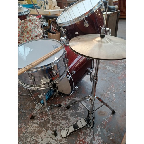 784 - A Performance Percussion five piece drum kit comprising bass drum, floor tom, two rack toms, snare w... 