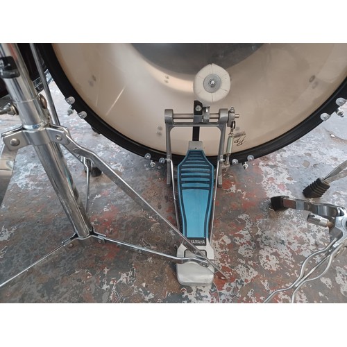 784 - A Performance Percussion five piece drum kit comprising bass drum, floor tom, two rack toms, snare w... 