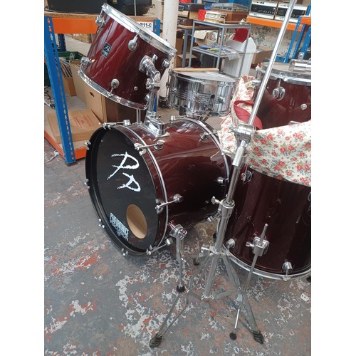 784 - A Performance Percussion five piece drum kit comprising bass drum, floor tom, two rack toms, snare w... 