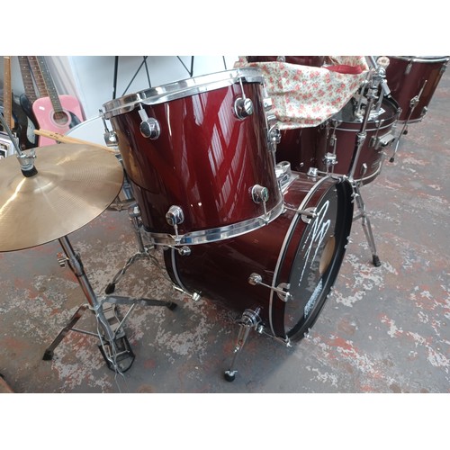 784 - A Performance Percussion five piece drum kit comprising bass drum, floor tom, two rack toms, snare w... 